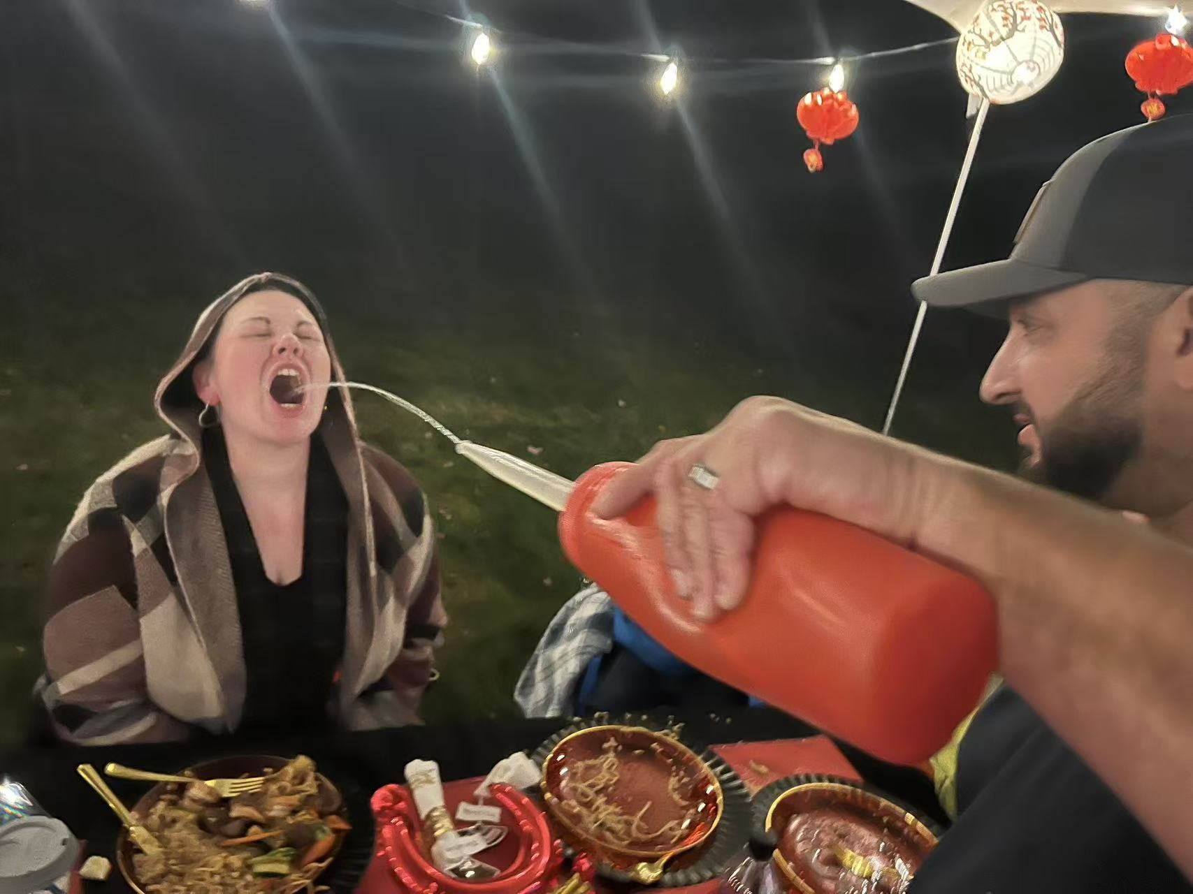 Hibachi chef performing tricks at New England home party